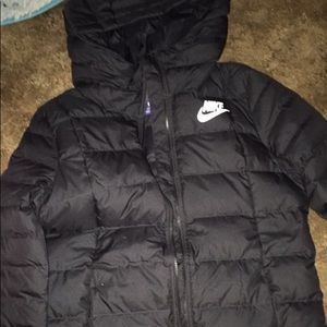 Black nike coat.
